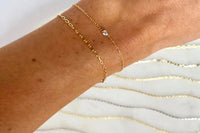Permanent welded bracelet for one; choice of gold or silver chain